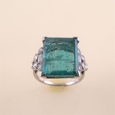 Appraisal: A large emerald and diamond ring the rectangular cut emerald