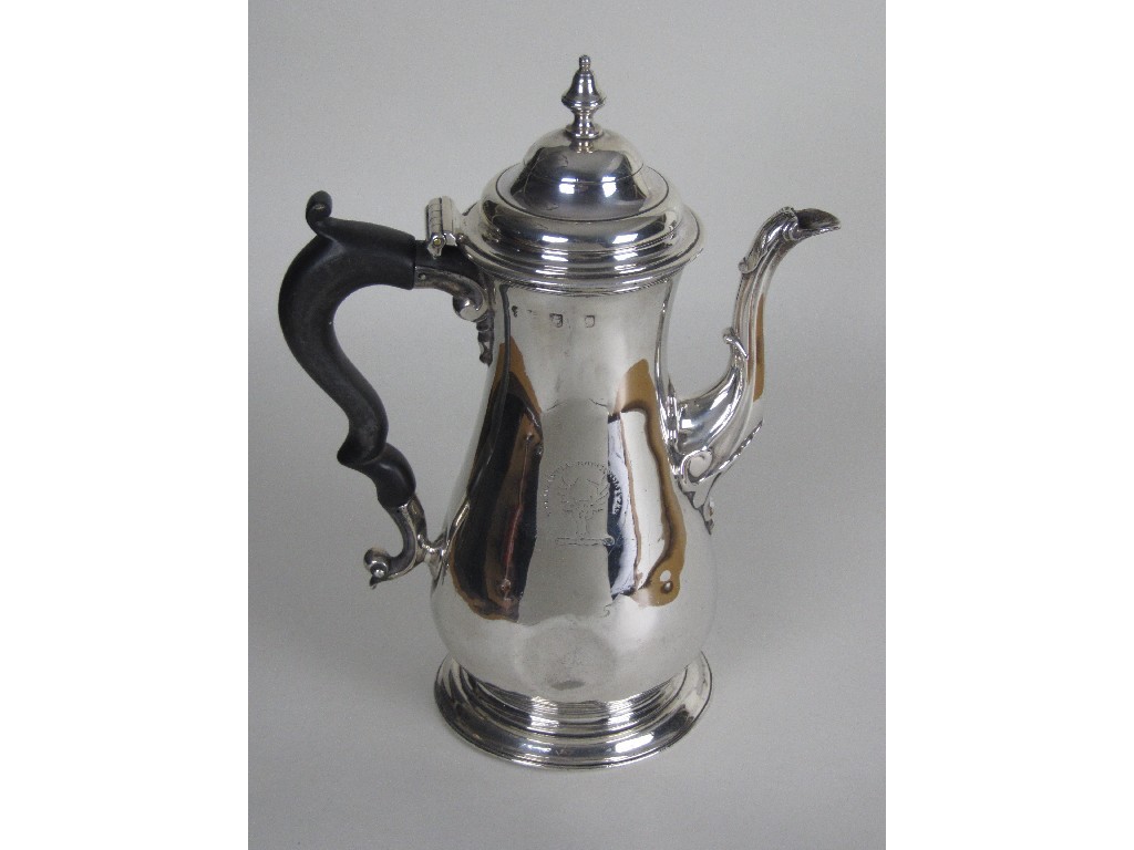 Appraisal: A George II silver baluster coffee pot the domed hinged