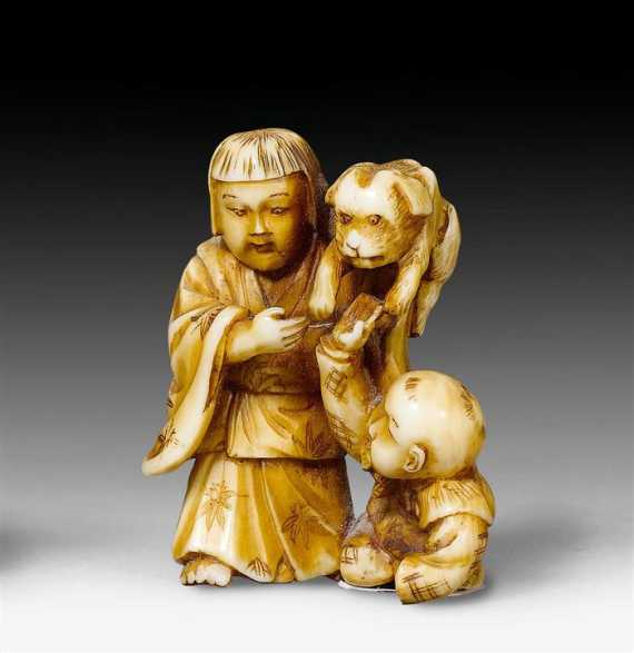 Appraisal: AN IVORY NETSUKE OF A GIRL AND A LITTLE BOY