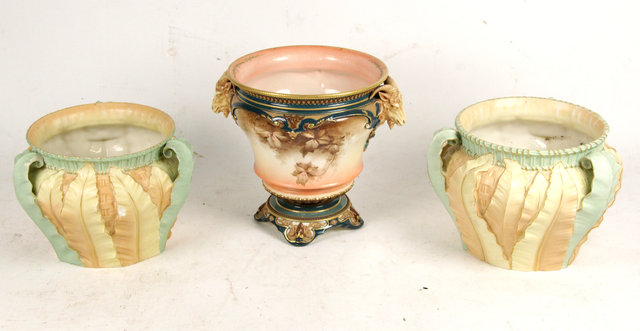 Appraisal: A pair of Royal Worcester jardini res moulded with fern-leaf