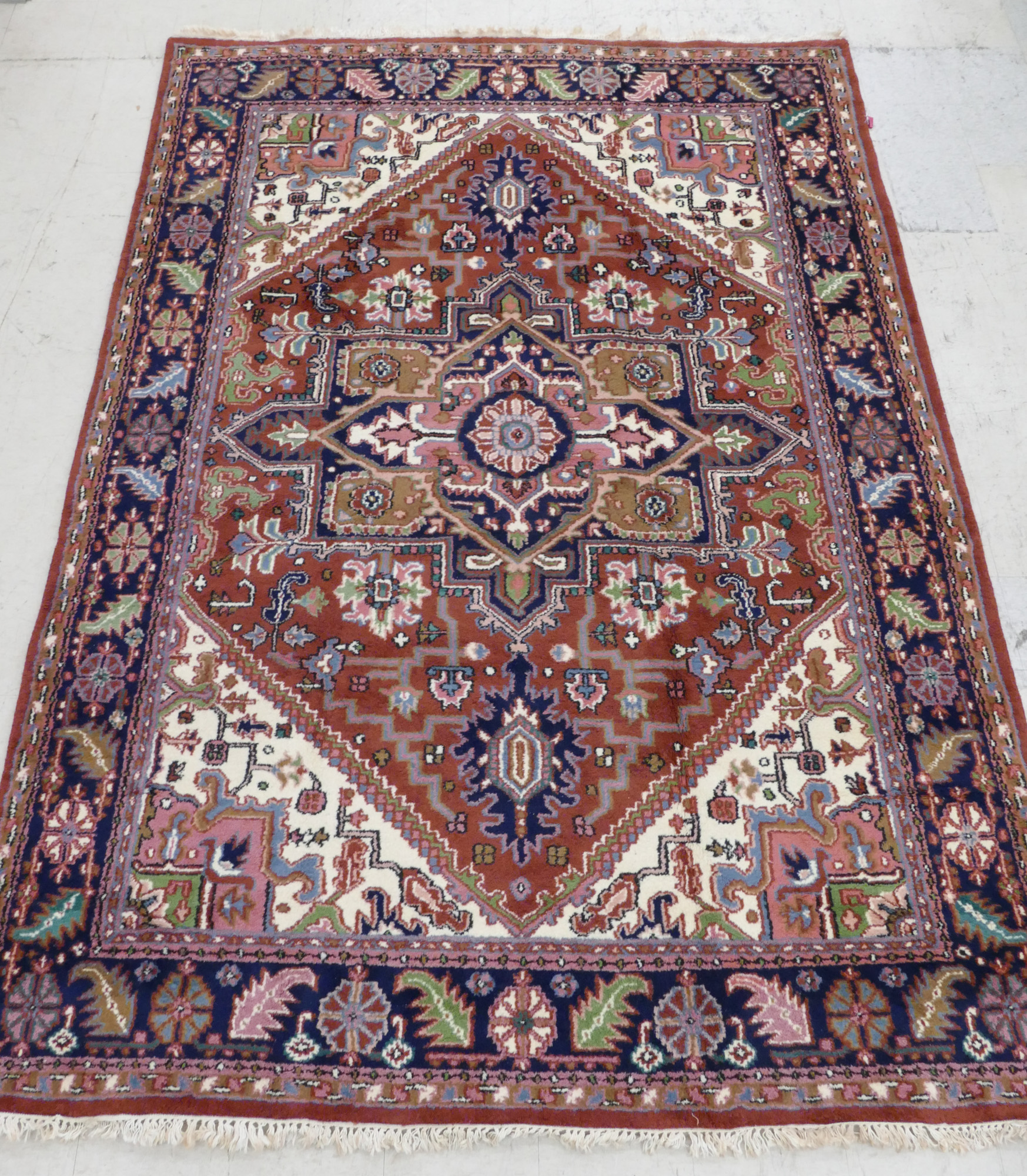 Appraisal: Persian Heriz Oriental Rug 'x '' Geometric medallion motif Overall