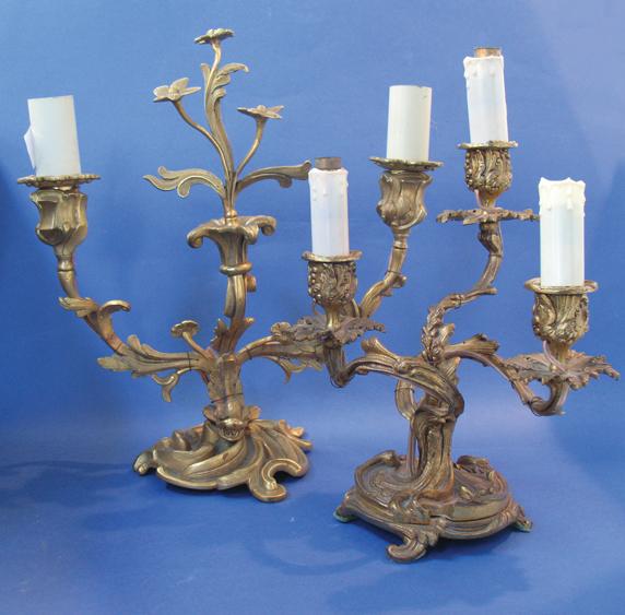 Appraisal: TWO SIMILAR GILT METAL ROCOCO REVIVAL CANDELABRA one with two