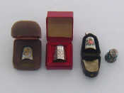 Appraisal: Four silver thimbles comprising an enamelled Charles and Diana commemorative