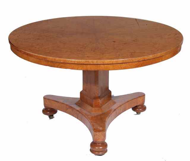 Appraisal: AN EARLY VICTORIAN POLLARD OAK SNAP TOP CIRCULAR BREAKFAST TABLE