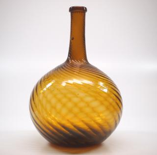 Appraisal: Pattern An early th century pattern-molded glass globular bottle Midwestern