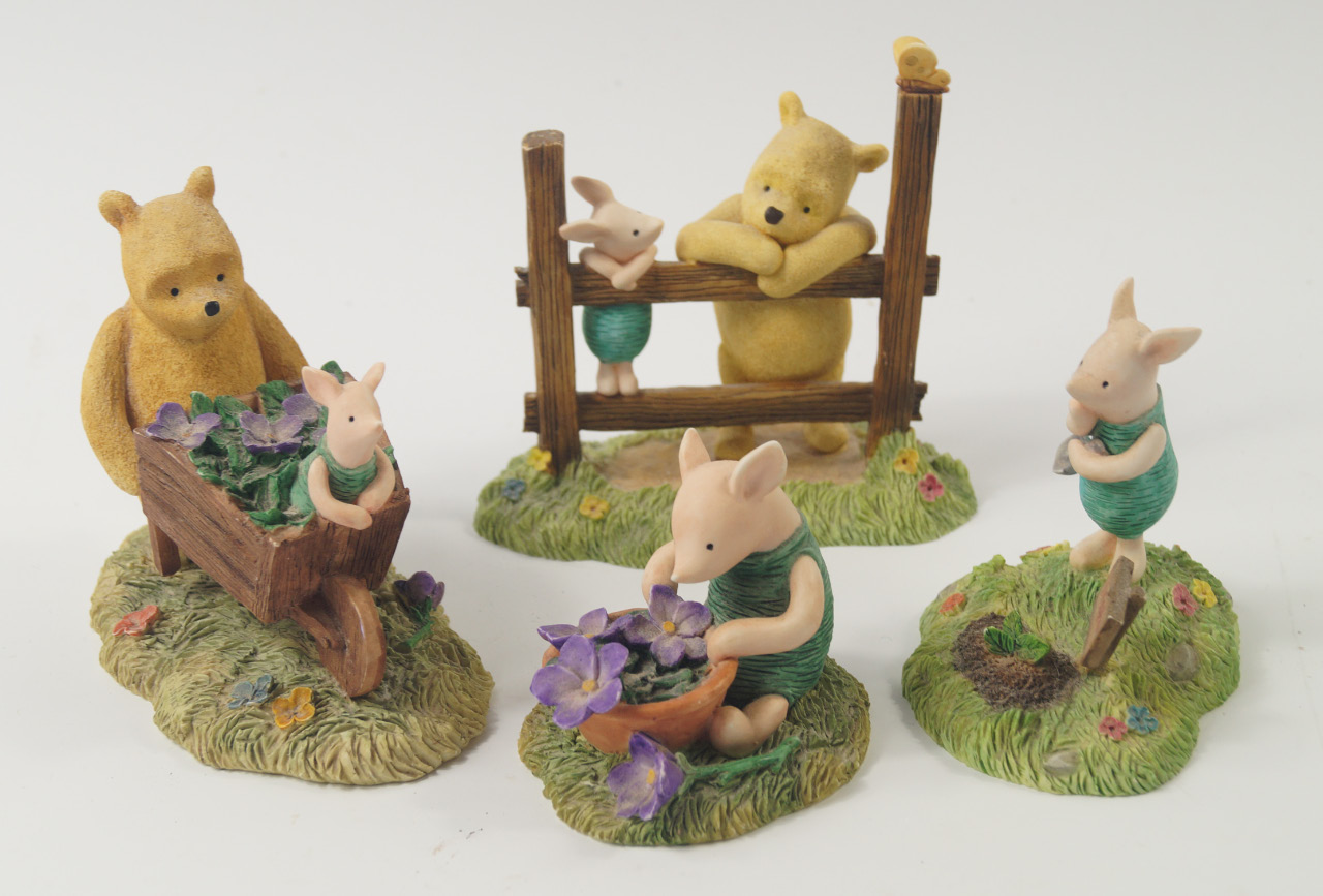 Appraisal: Four Border Fine Arts sculptures boxed comprising Pooh Piglet leaning