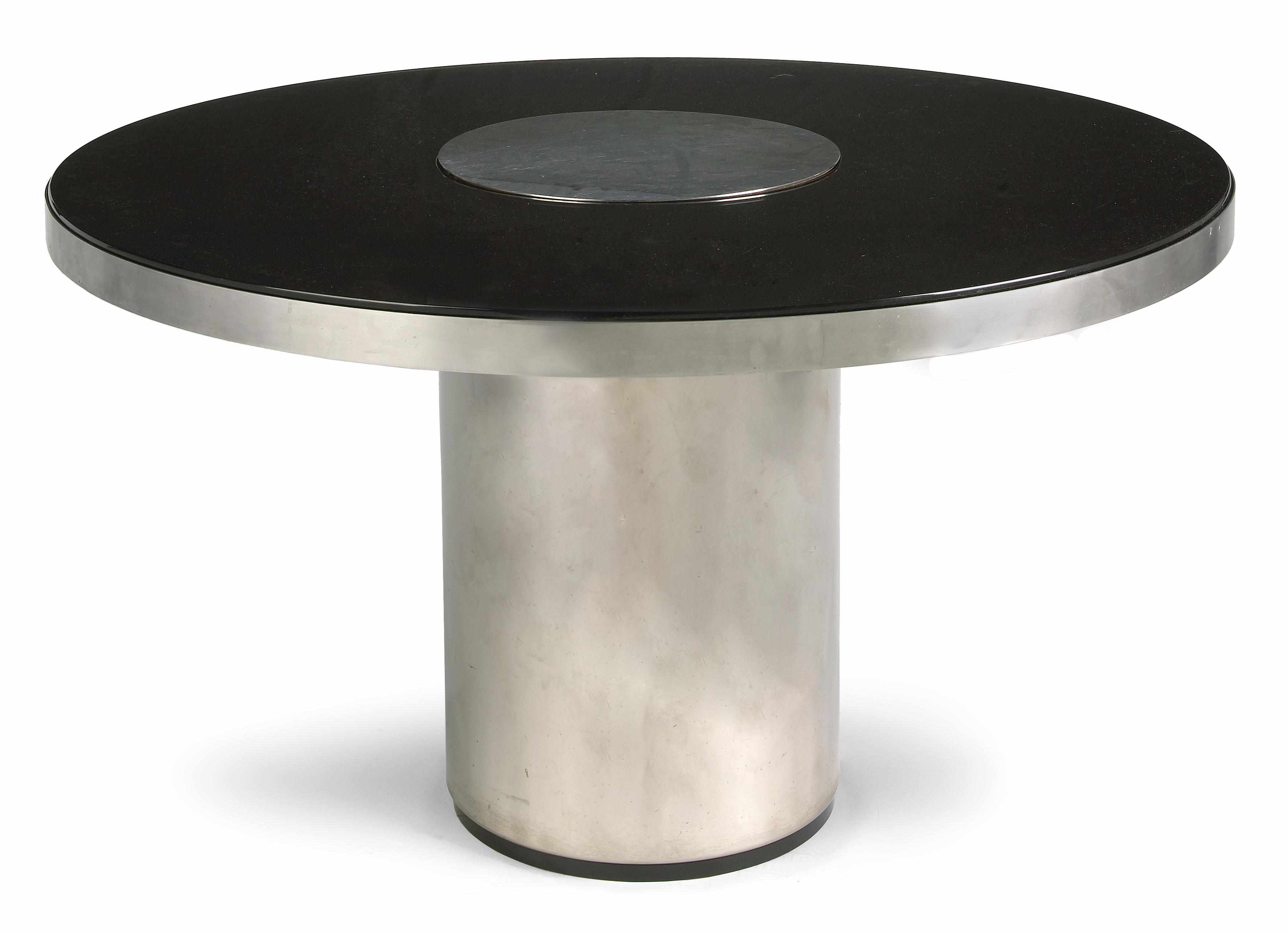 Appraisal: A Willy Rizzo stainless steel and black glass dining table