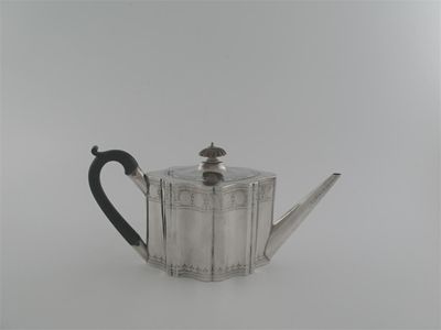 Appraisal: A George III shaped oval teapot with vertical sides a