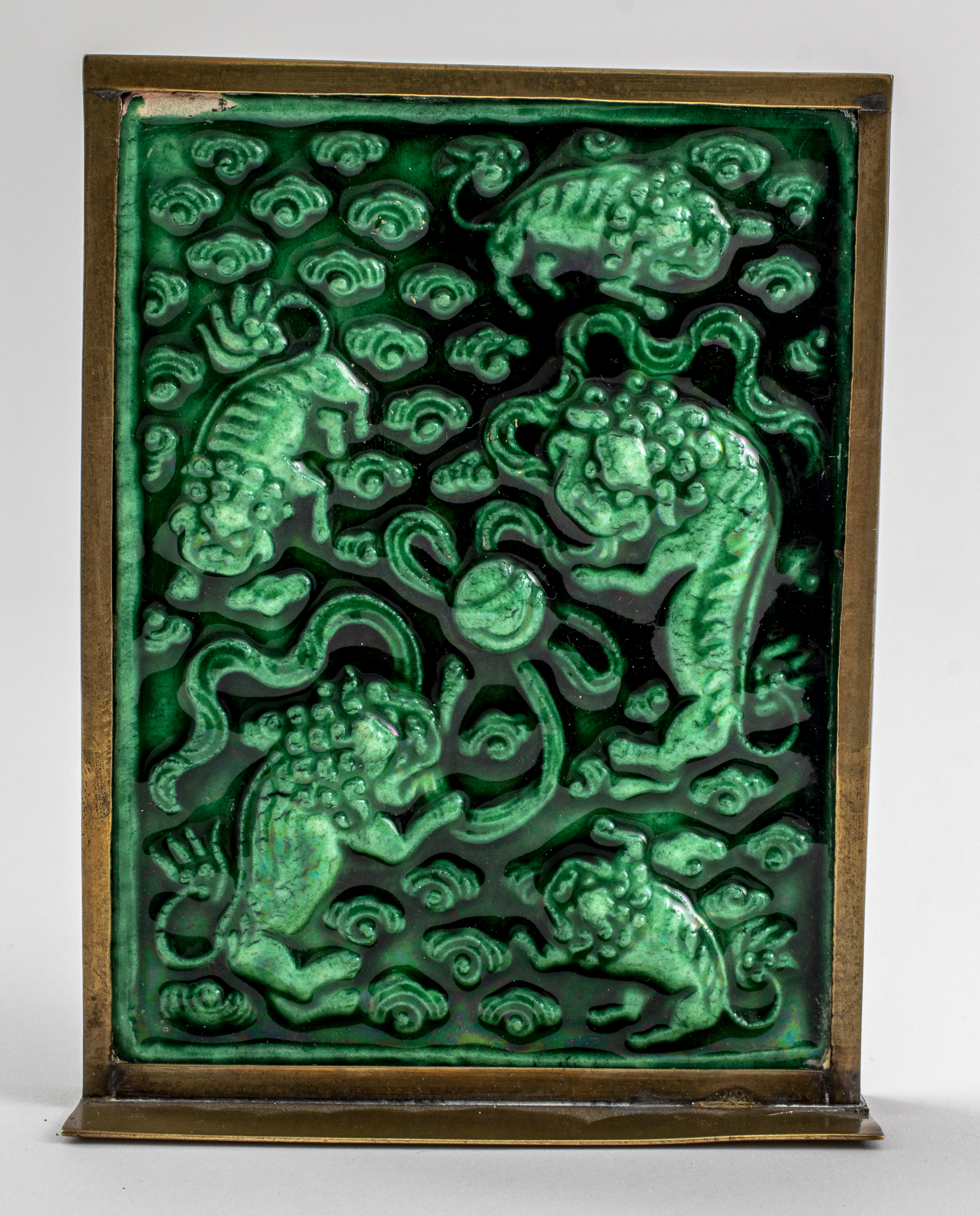 Appraisal: CHINESE GREEN GLAZED CERAMIC TILE WITH LIONS Chinese green glazed