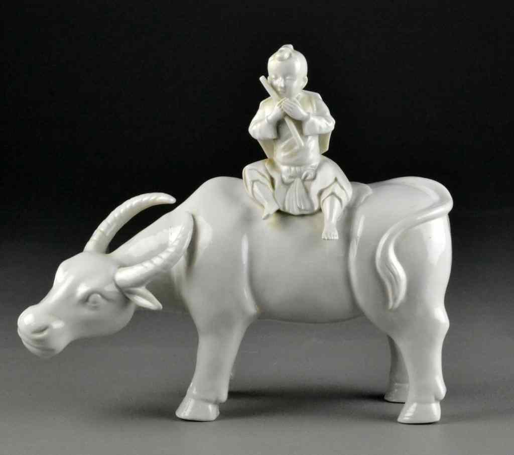 Appraisal: Chinese Blanc de Chine FigureDepicting an oxen with a young