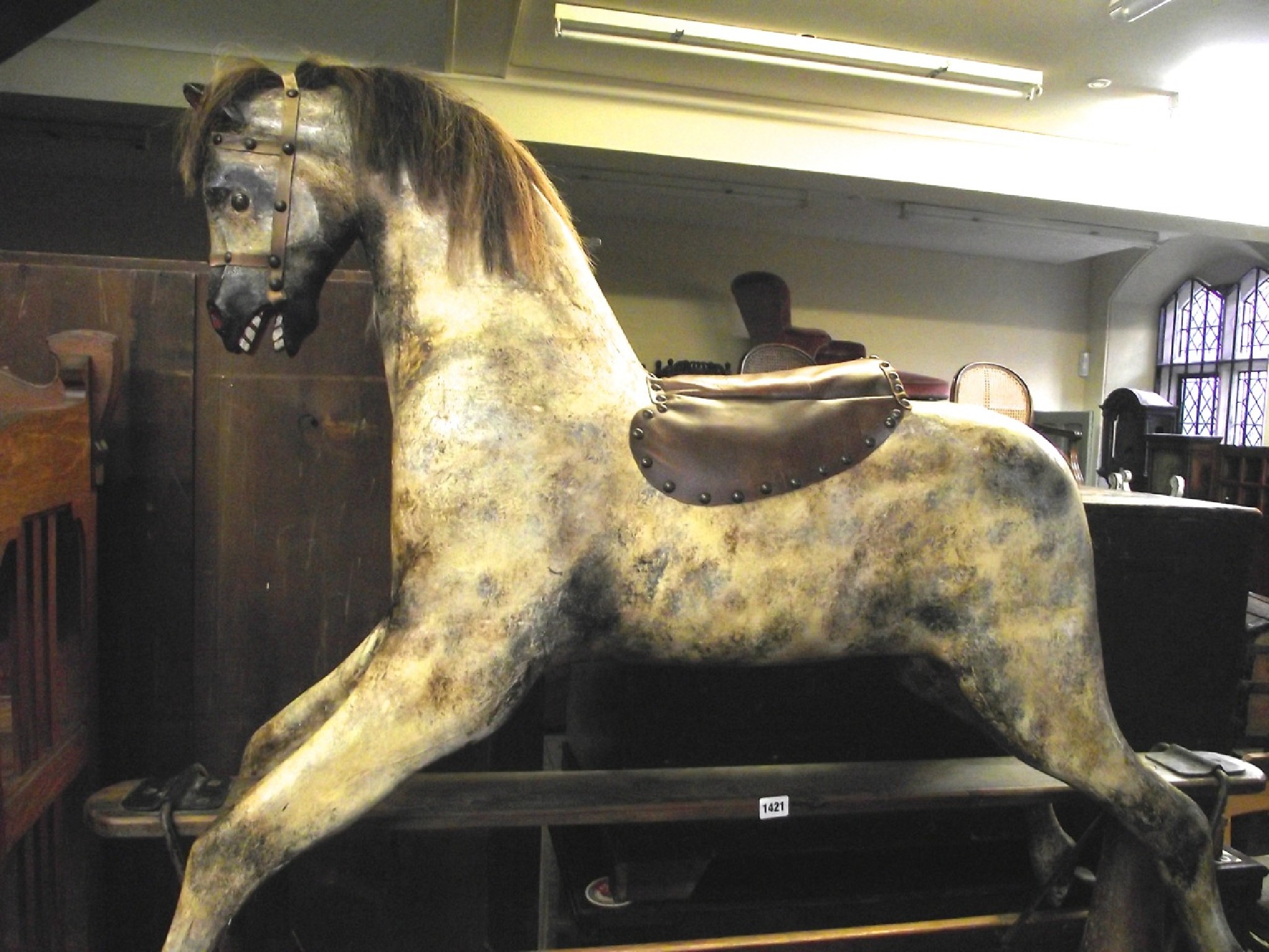 Appraisal: A substantial Edwardian rocking horse with dapple grey finish raised