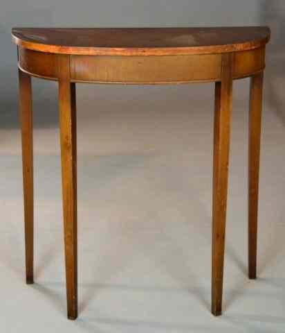 Appraisal: A Demi-Lune Mahogany Hall TableHalf circle top with smooth apron