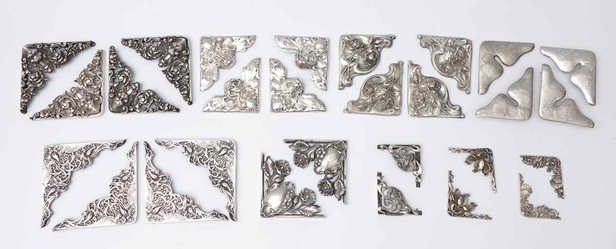 Appraisal: COLLECTION OF ART NOUVEAU STERLING BLOTTER CORNERS sets to include