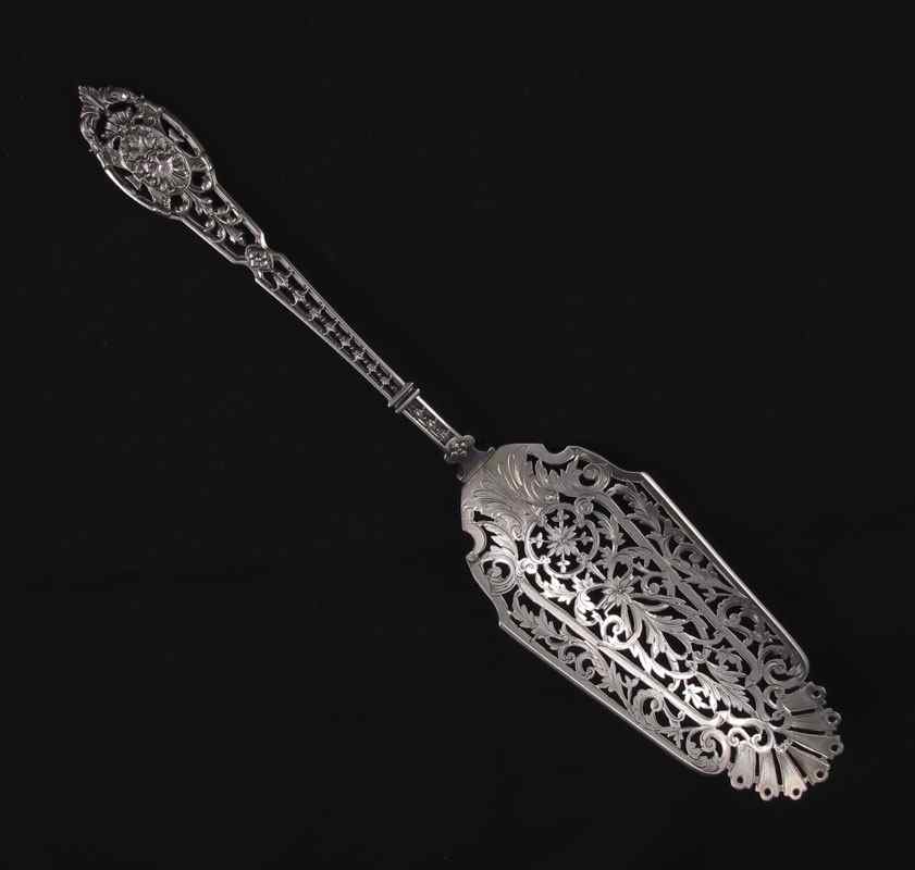 Appraisal: EMILE PUIFORCAT FRENCH SILVER CAKE SERVER Pierced and engraved handle