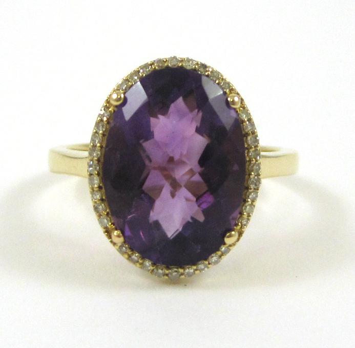 Appraisal: AMETHYST DIAMOND AND FOURTEEN KARAT GOLD RING with round-cut diamonds