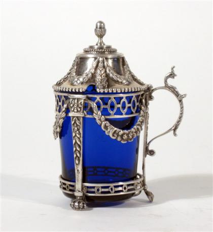 Appraisal: French Neoclassical style silver pierced mustard potWith an acorn finial