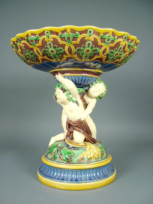 Appraisal: A Minton style majolica centre piece the dished top held