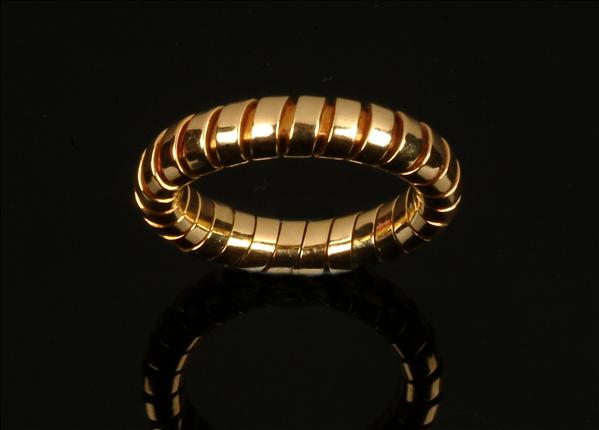 Appraisal: An carat gold Tubogas ring by Bulgari signed Bvlgari stamped