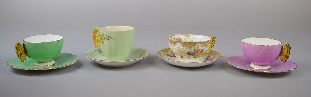 Appraisal: Aynsley Butterfly Tea Cups Saucers Largest cup H Chip on