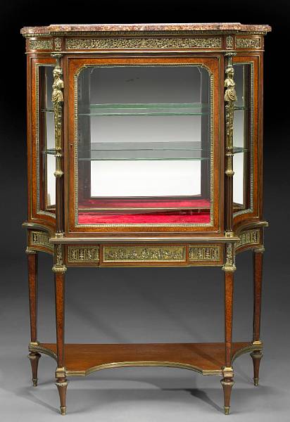 Appraisal: A Louis XVI style gilt bronze mounted amboyna and mahogany