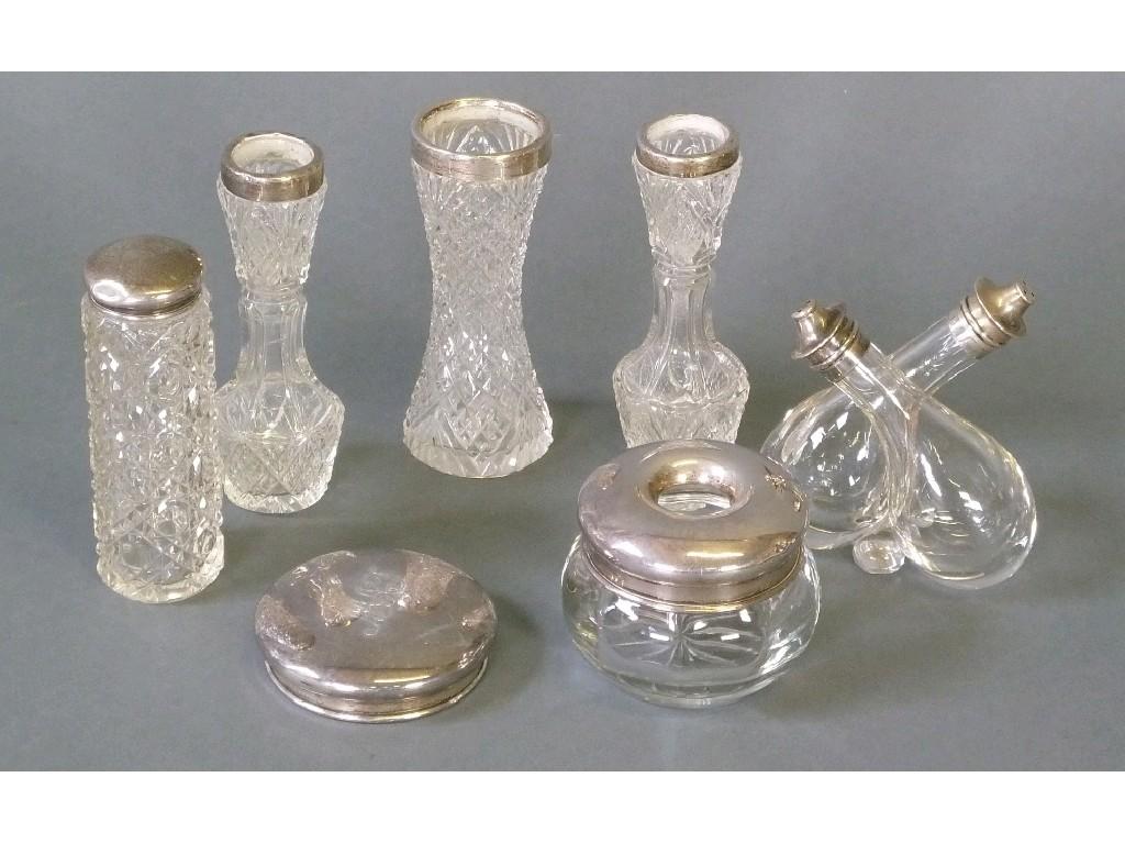 Appraisal: EARLY TWENTIETH CENTURY CLEAR GLASS SILVER TOPPED DOUBLE PEPPERETTE repaired