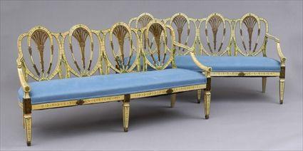 Appraisal: PAIR OF GEORGE III-STYLE CREAM-GROUND PAINTED FOUR-CHAIR BACK SETTEES The