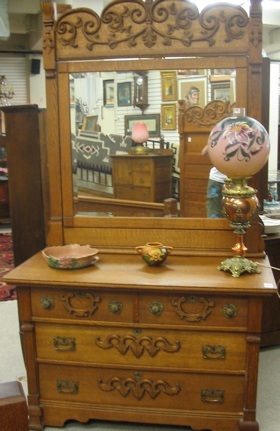 Appraisal: A VICTORIAN OAK DRESSER WITH ATTACHED MIRROR American c the