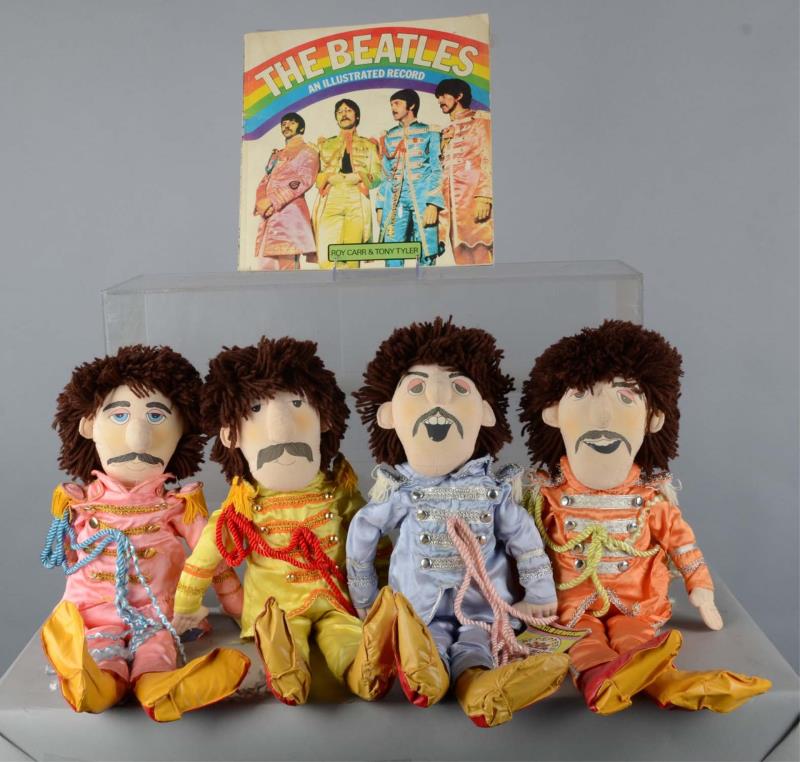 Appraisal: Lot Of Beatles Sgt Pepper Applause Dolls And Book This