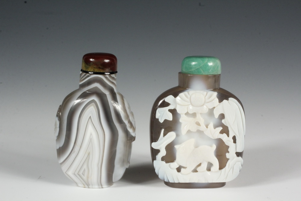 Appraisal: A GROUP OF AGATE SNUFF BOTTLES - Including A Striated