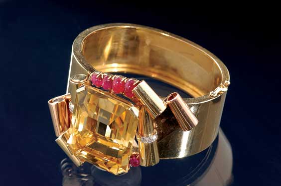 Appraisal: RETRO CITRINE RUBY AND DIAMOND BRACELET Of hinged design featuring