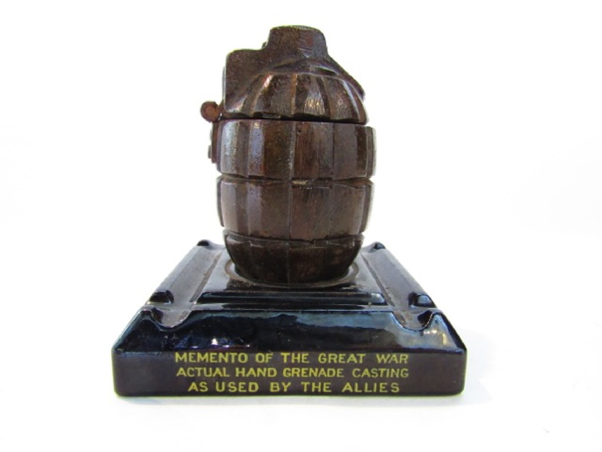 Appraisal: A World War One hand grenade cut and mounted to