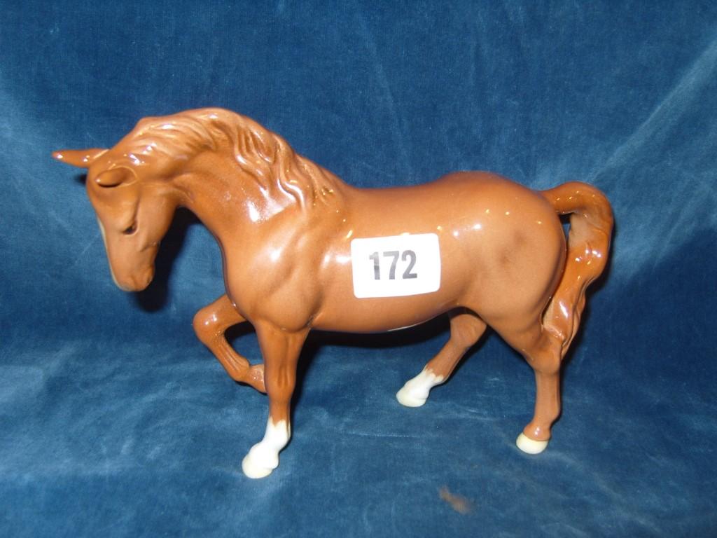 Appraisal: A Beswick horse with golden brown colourway white flash and