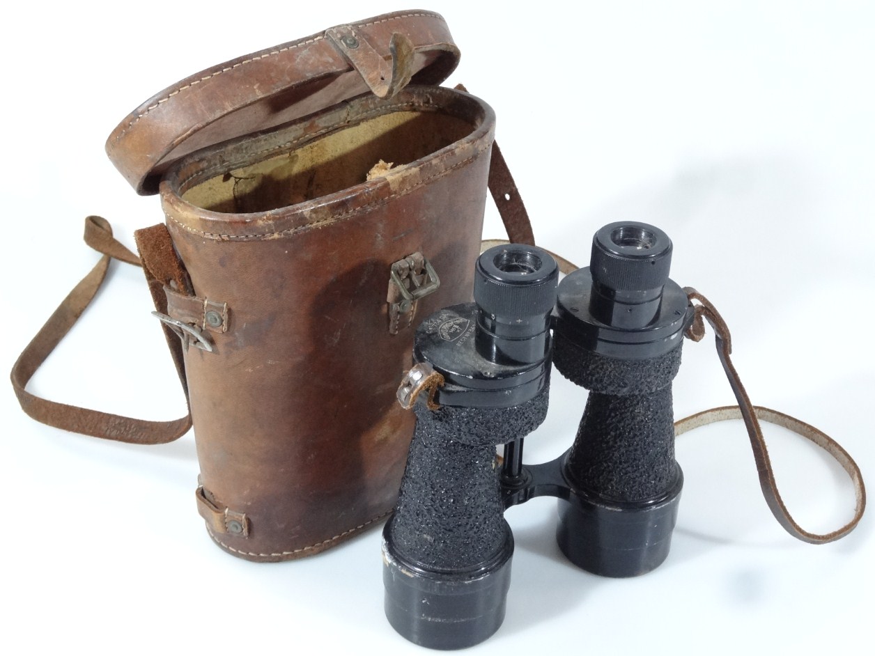 Appraisal: A pair of Beano Prism GA binoculars in brown leather