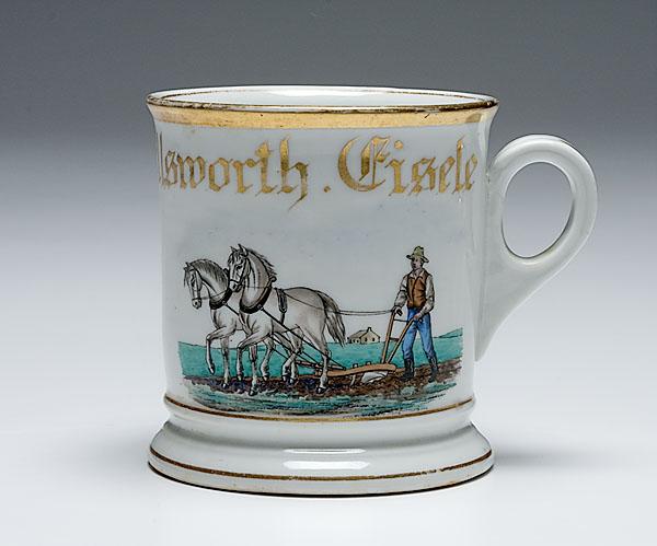 Appraisal: FARMER'S OCCUPATIONAL SHAVING MUG porcelain farmer plowing grassland