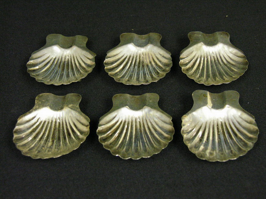 Appraisal: SIX STERLING SHELL ASHTRAYS Signed A L sterling Mexico Size