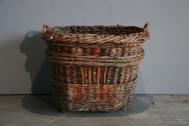 Appraisal: Two large antique grape baskets