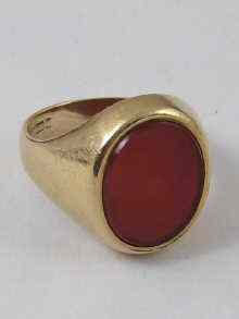 Appraisal: A ct gold gents signet ring set with an engraved