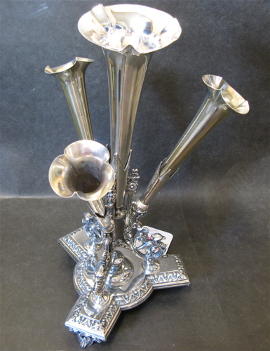 Appraisal: VICTORIAN SILVER PLATED -TRUMPET VASE EPERGNE with winged dragon head