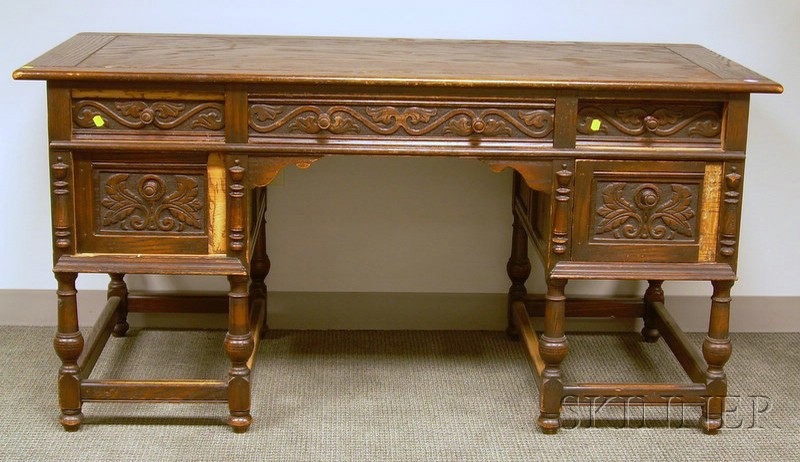 Appraisal: Jacobean-style Carved Oak Flat-top Desk ht lg wd in