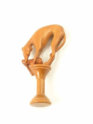 Appraisal: An th century carved boxwood pipe tamper modelled as a