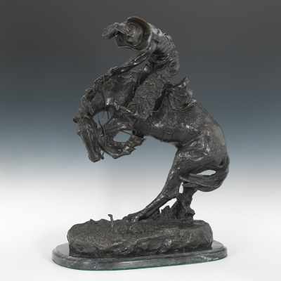 Appraisal: After Frederick Remington Rattlesnake Rattlesnake Modern cast bronze with brown