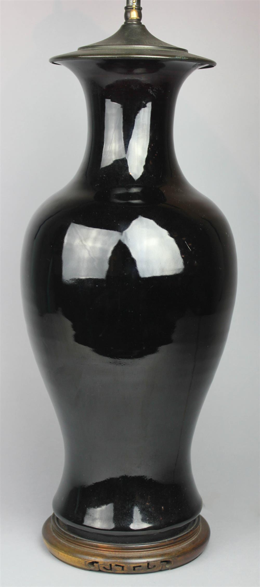 Appraisal: CHINESE BLACK-GLAZED VASE QING DYNASTY the high shouldered vase now