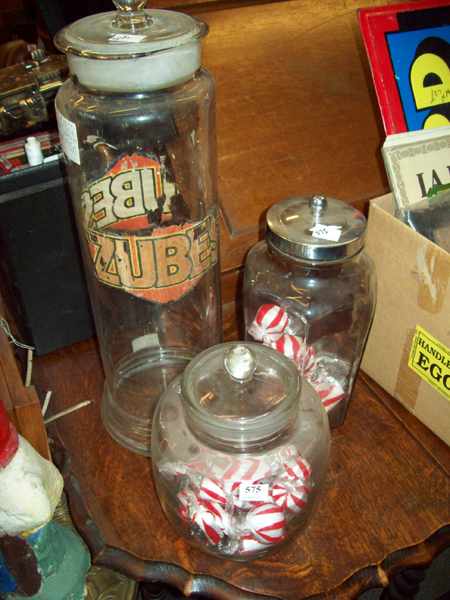 Appraisal: A GROUP OF THREE 'S GLASS LOLLY JARS