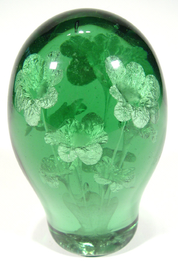 Appraisal: Victorian green glass dump weight with floral decoration cm high