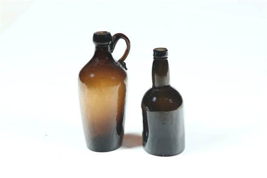 Appraisal: TWO BOTTLES American th century blown molded glass Amber with