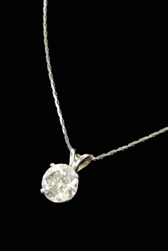 Appraisal: DIAMOND AND K WHITE GOLD PENDANT NECKLACE The pendant is