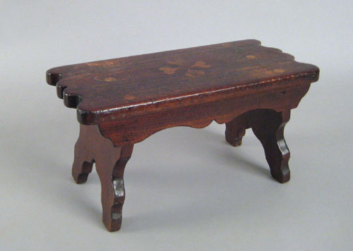 Appraisal: Pennsylvania walnut foot stool th c inlaid with hearts and