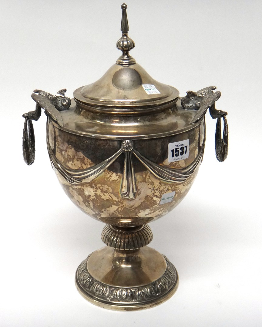 Appraisal: A twin handled trophy the body decorated with linen fold