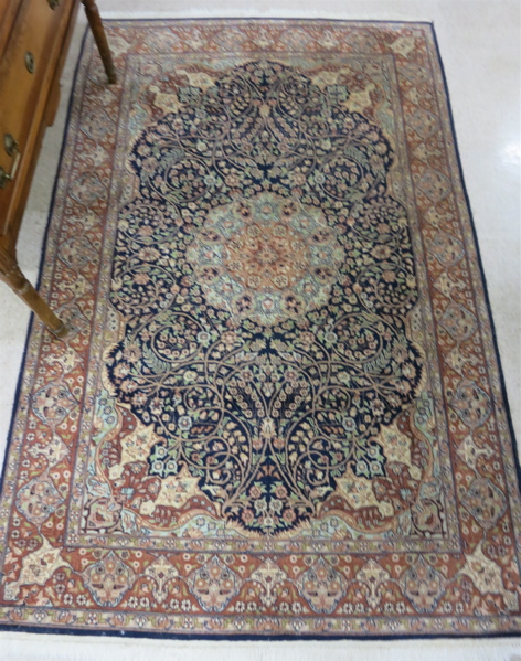 Appraisal: HAND KNOTTED ORIENTAL AREA RUG Pakistani-Persian Tabriz having a central