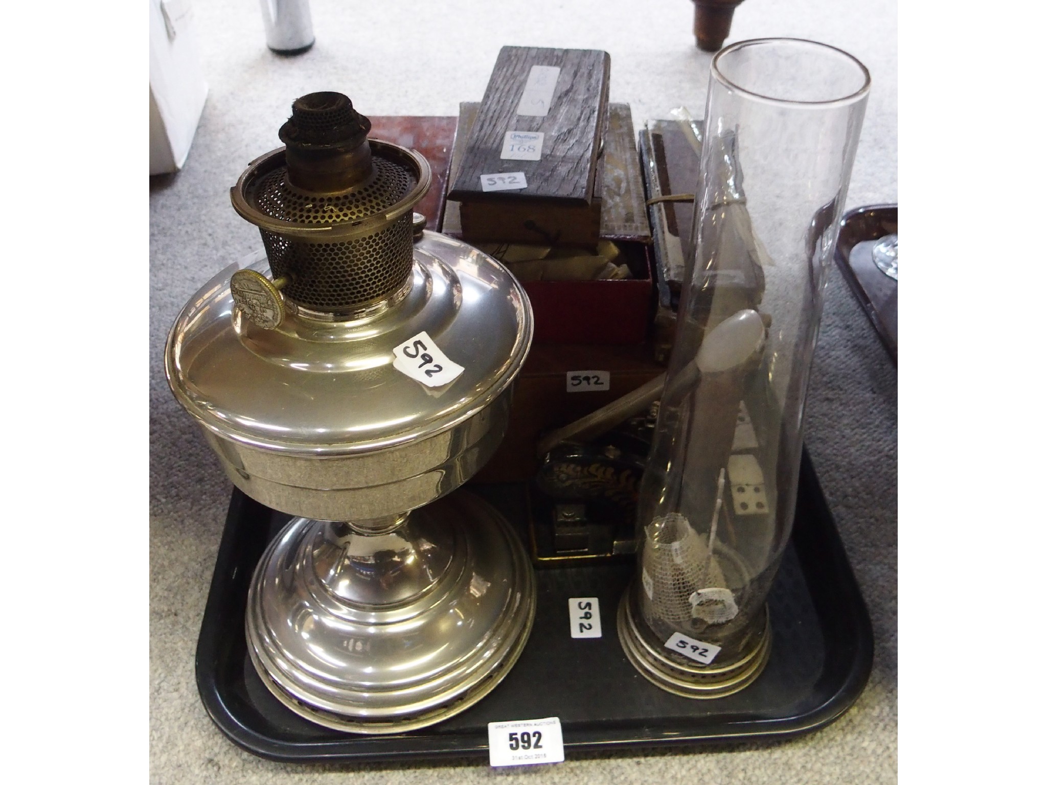 Appraisal: Tray comprising silvered metal oil lamp box of vintage dominos